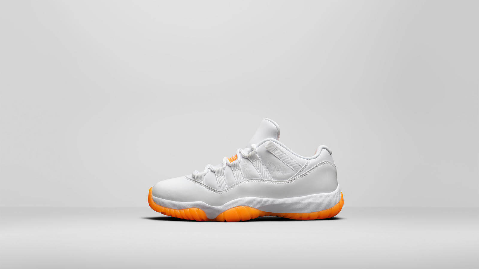 Zapatillas Air Jordan 11 low ‘Bright Citrus’ 2021 para chica o mujer