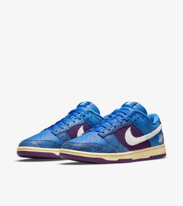 Nike Dunk Low Undefeated 5 on it