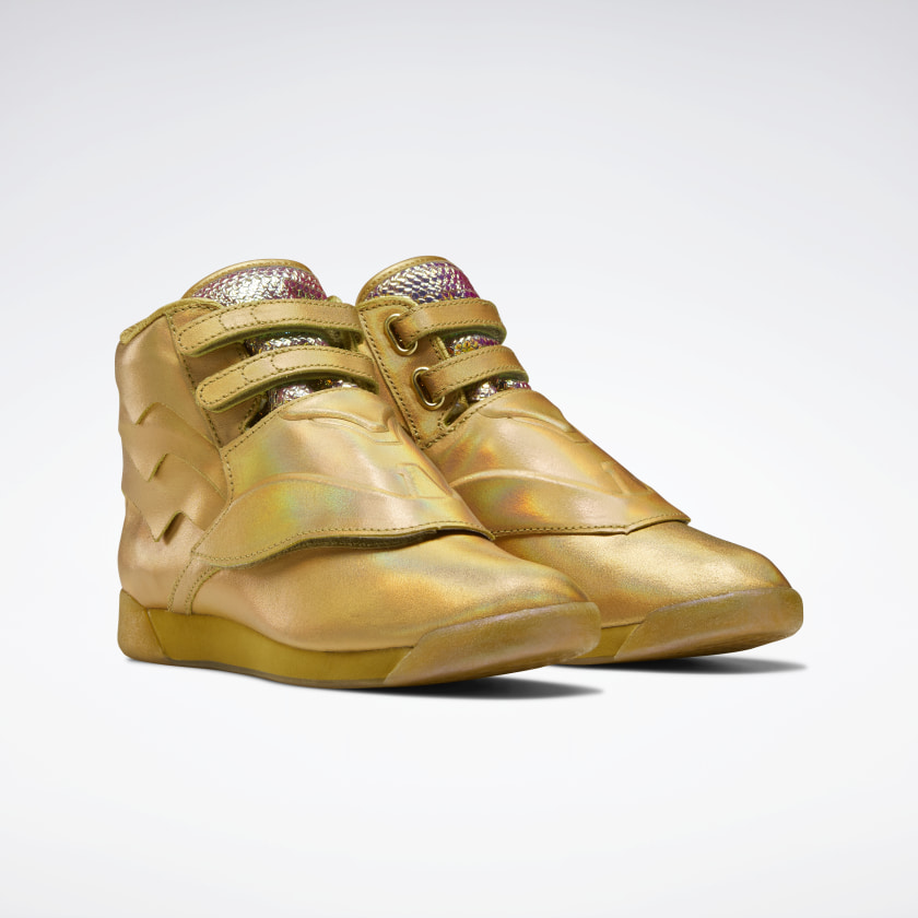 Gold reebok freestyle hi top